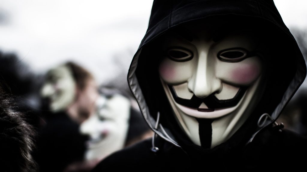 Person Wears A Guy Fawkes Mask Which Today Is A Trademark And Symbol For The Online Hacktivist Group Anonymous. 2012.